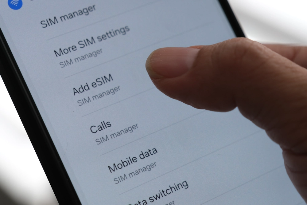 Is eSIM connected to phone number